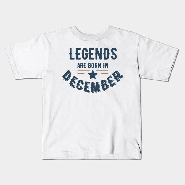 Legends Are Born In December Kids T-Shirt by vcent